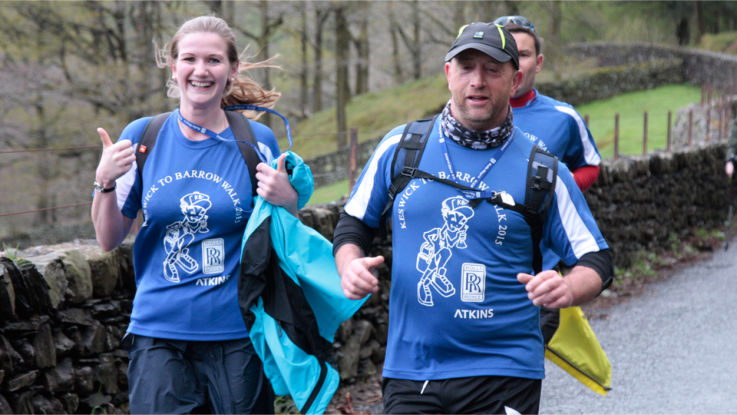 Walkers in blue t-shirts